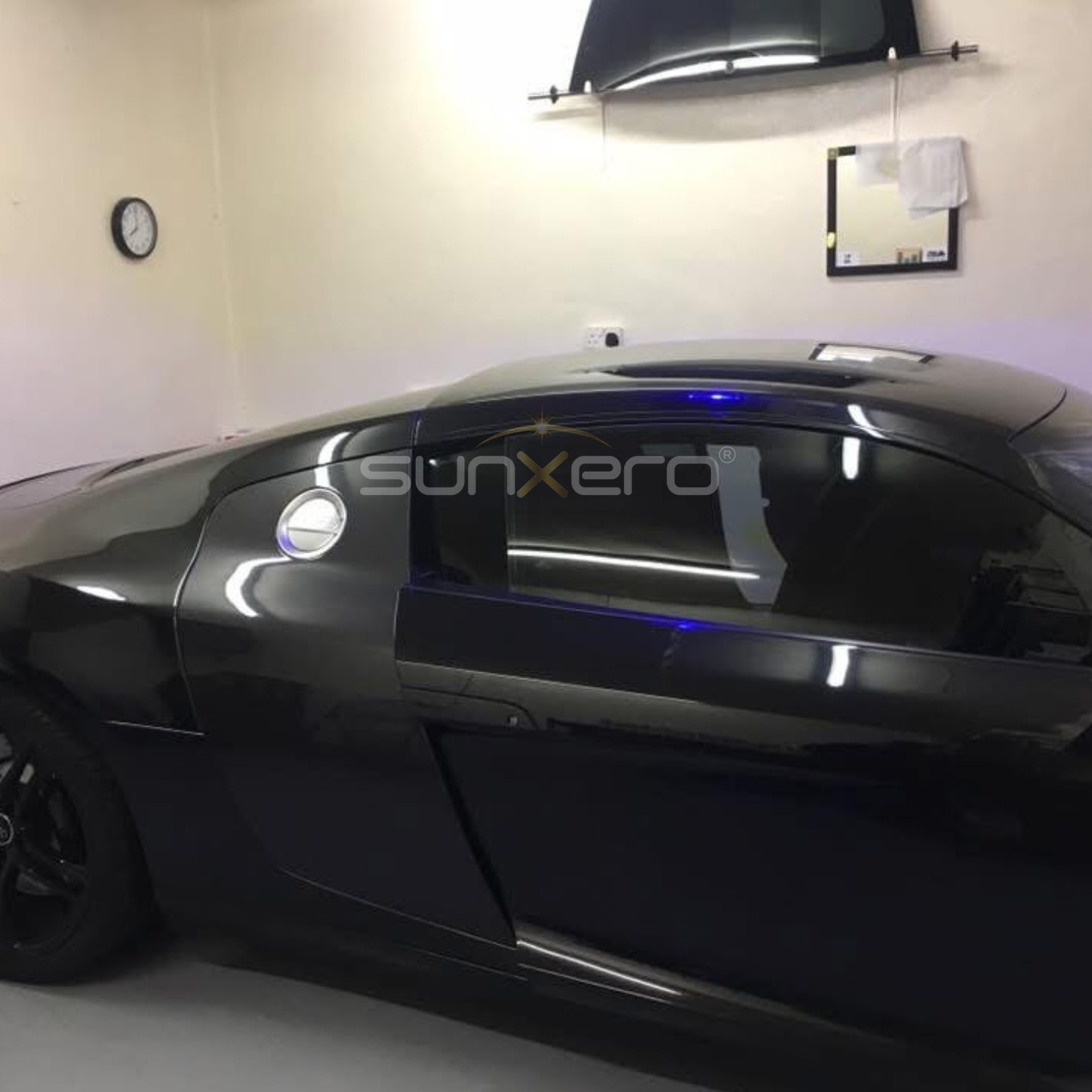 Futuristic Black Sports Car — Showroom