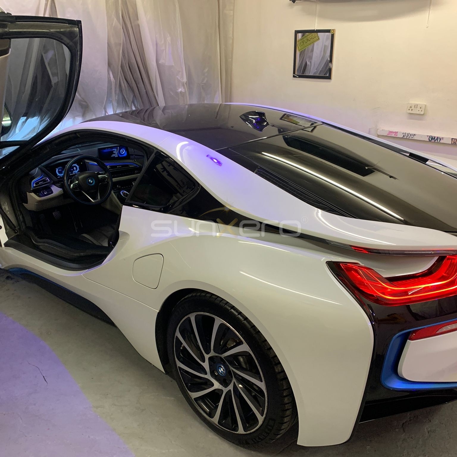 White BMW i8 — Indoor Showroom