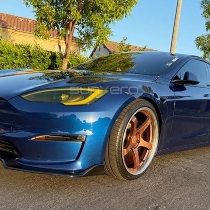Blue Sports Car — Bronze Wheels