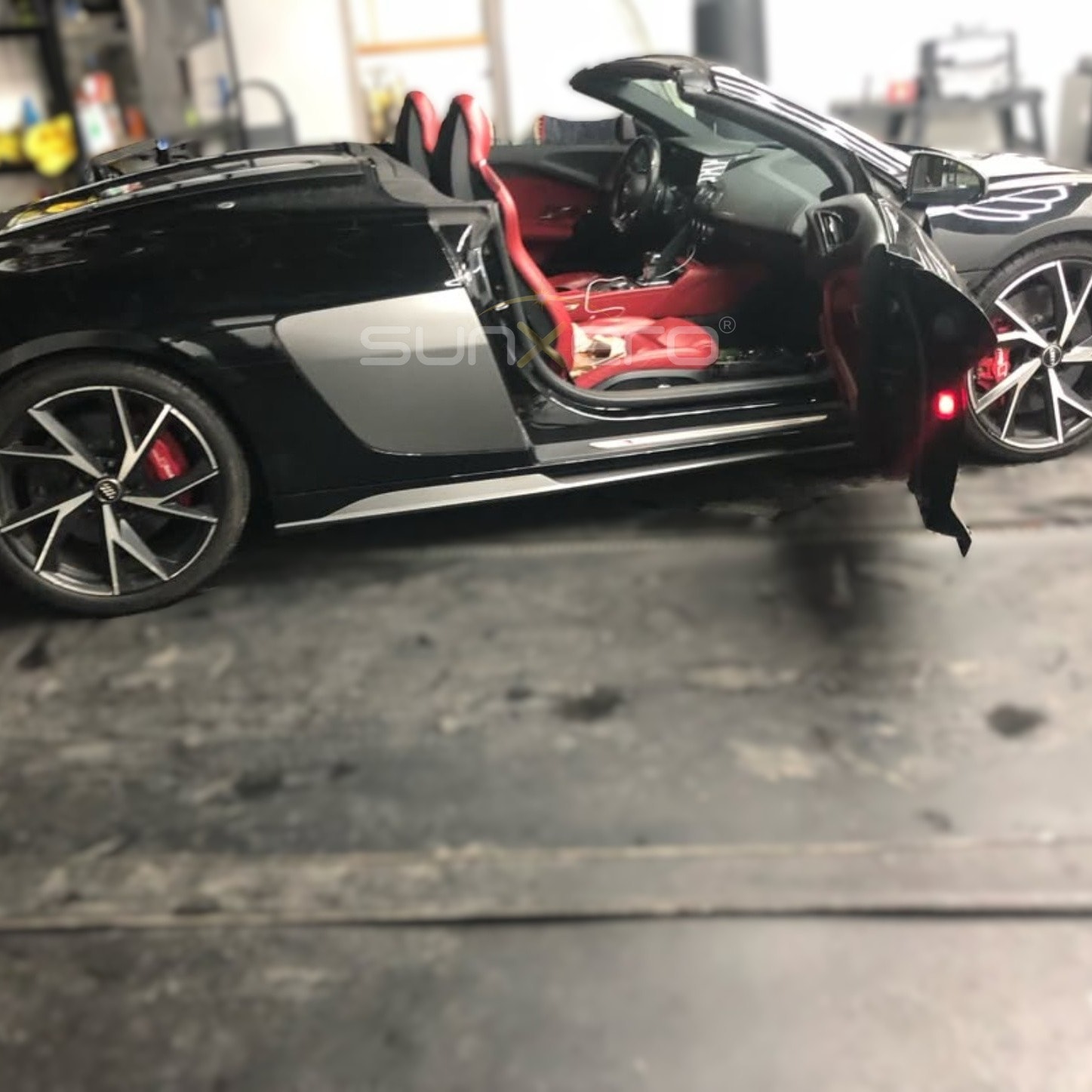 Black Sports Car — Red Interior
