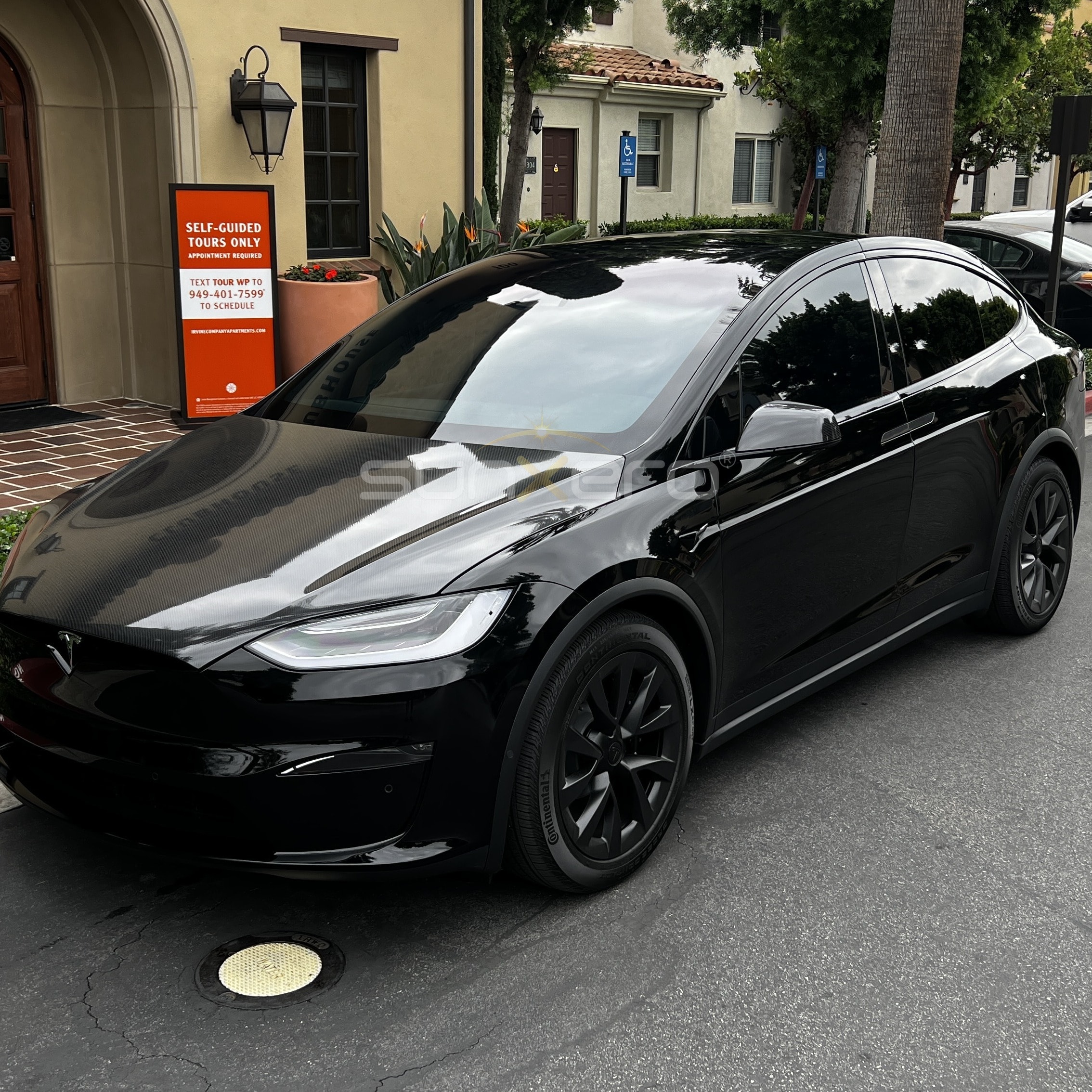 Black Tesla — Courtyard