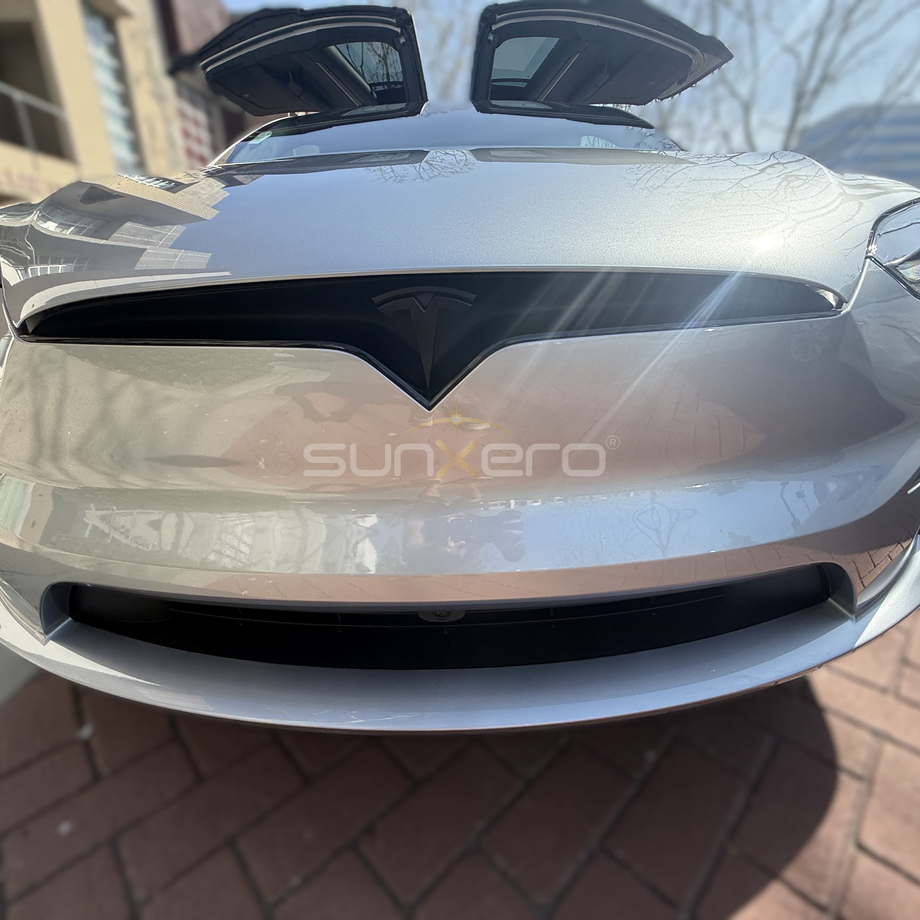 White Tesla — Sun Shade Installed