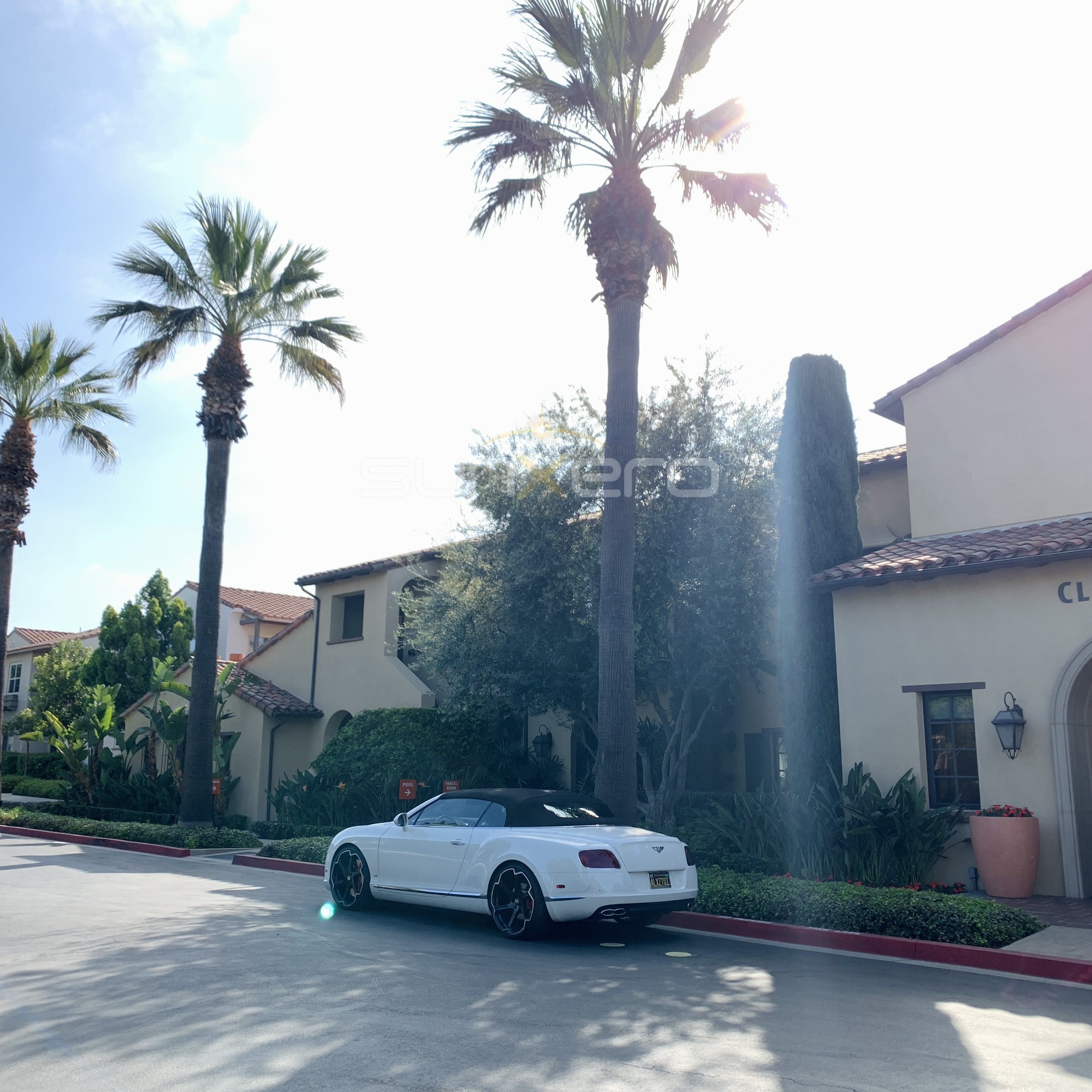 White Convertible — Luxury Estate