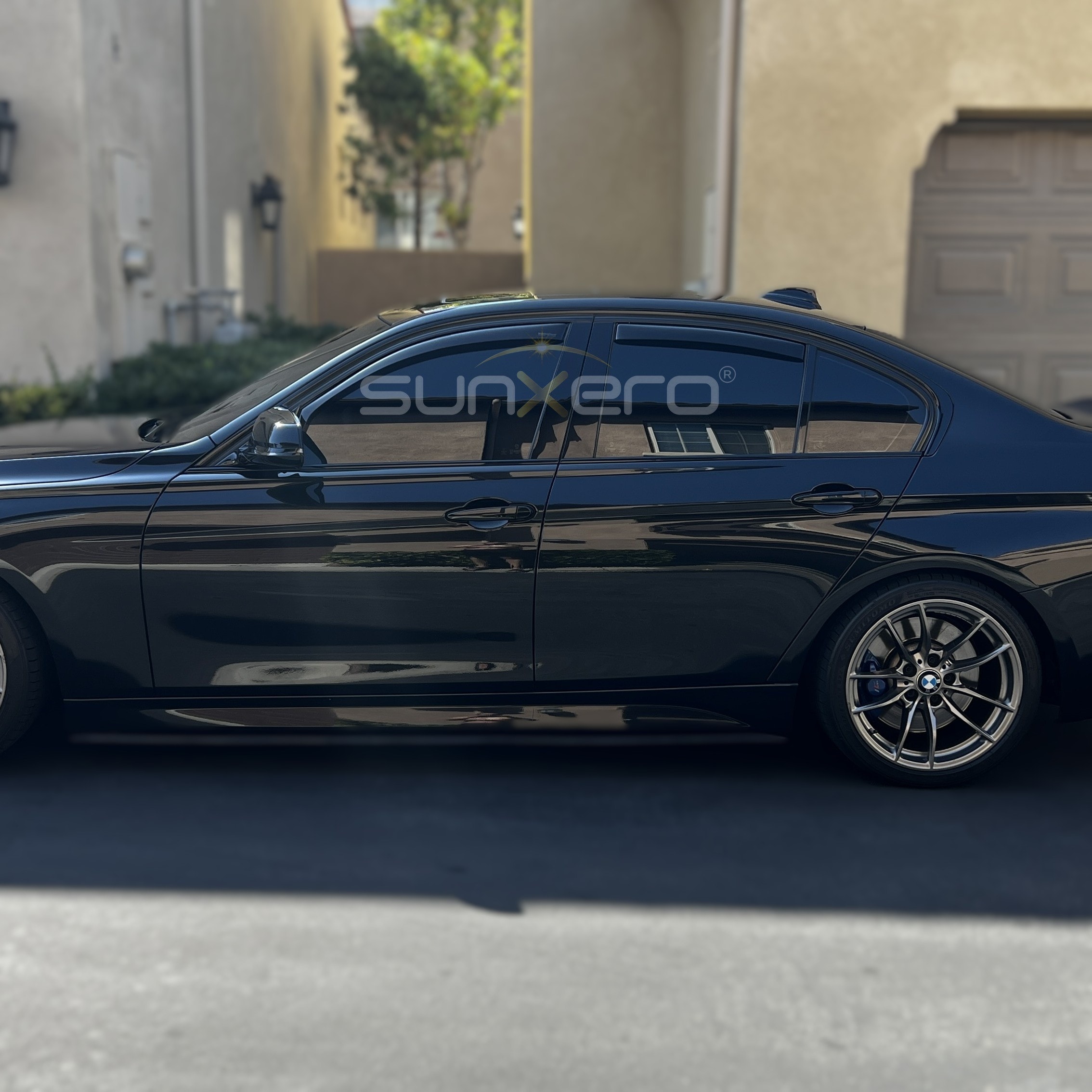Black BMW Sedan — Residential
