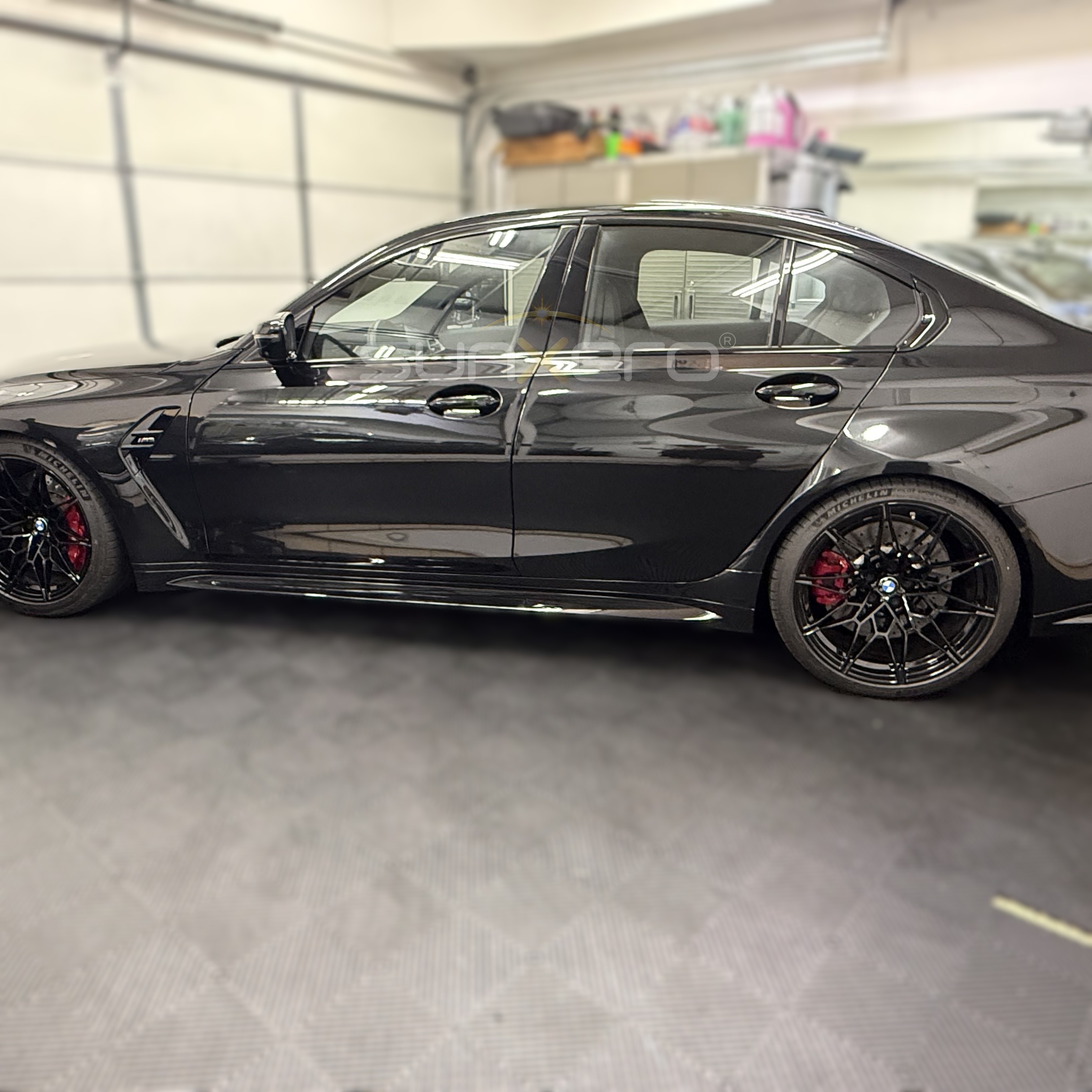 Black Sports Car — Garage Charging