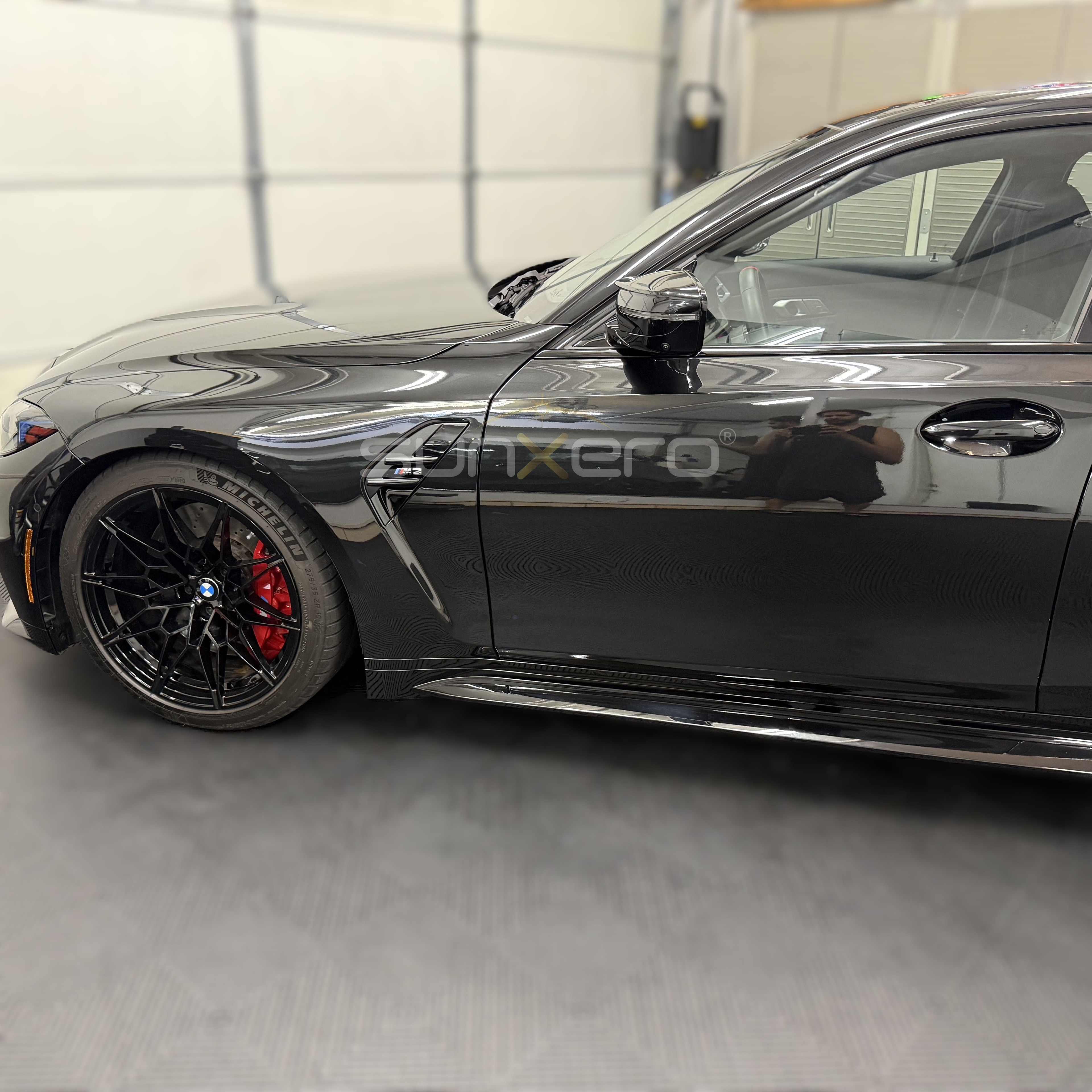 Black Sports Car — Garage