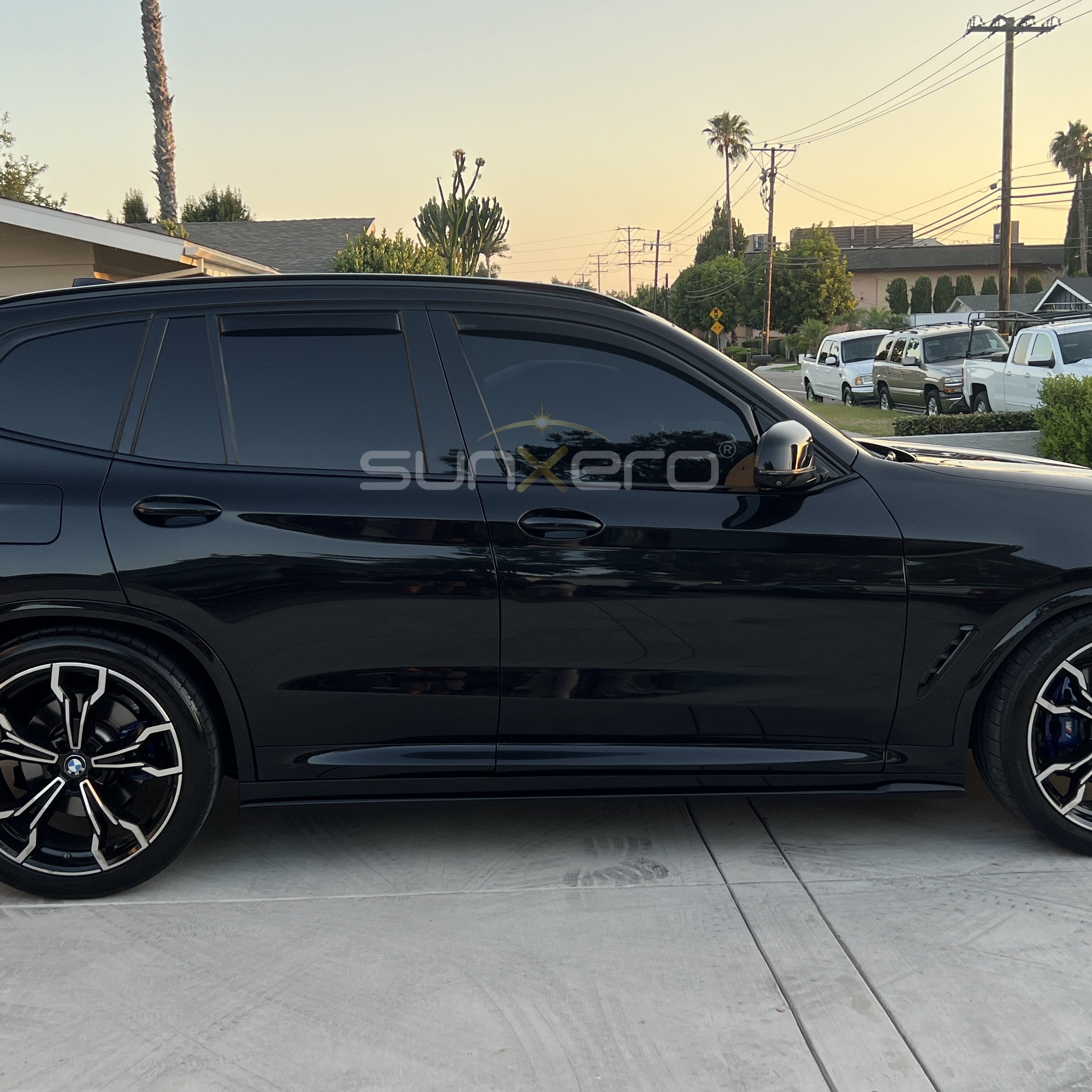 Black SUV — Residential Driveway