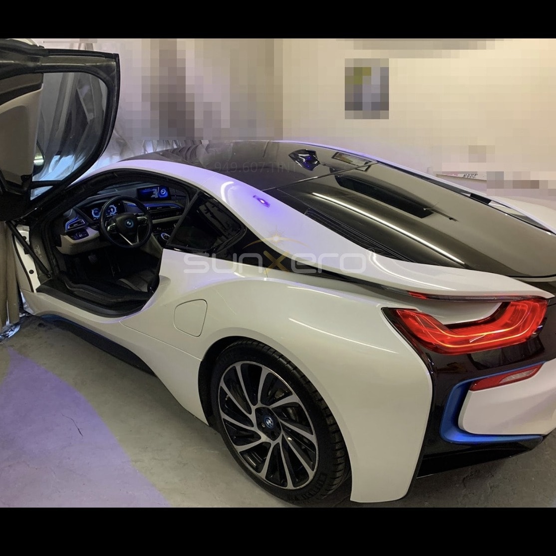 White Sports Car — Open Door Interior