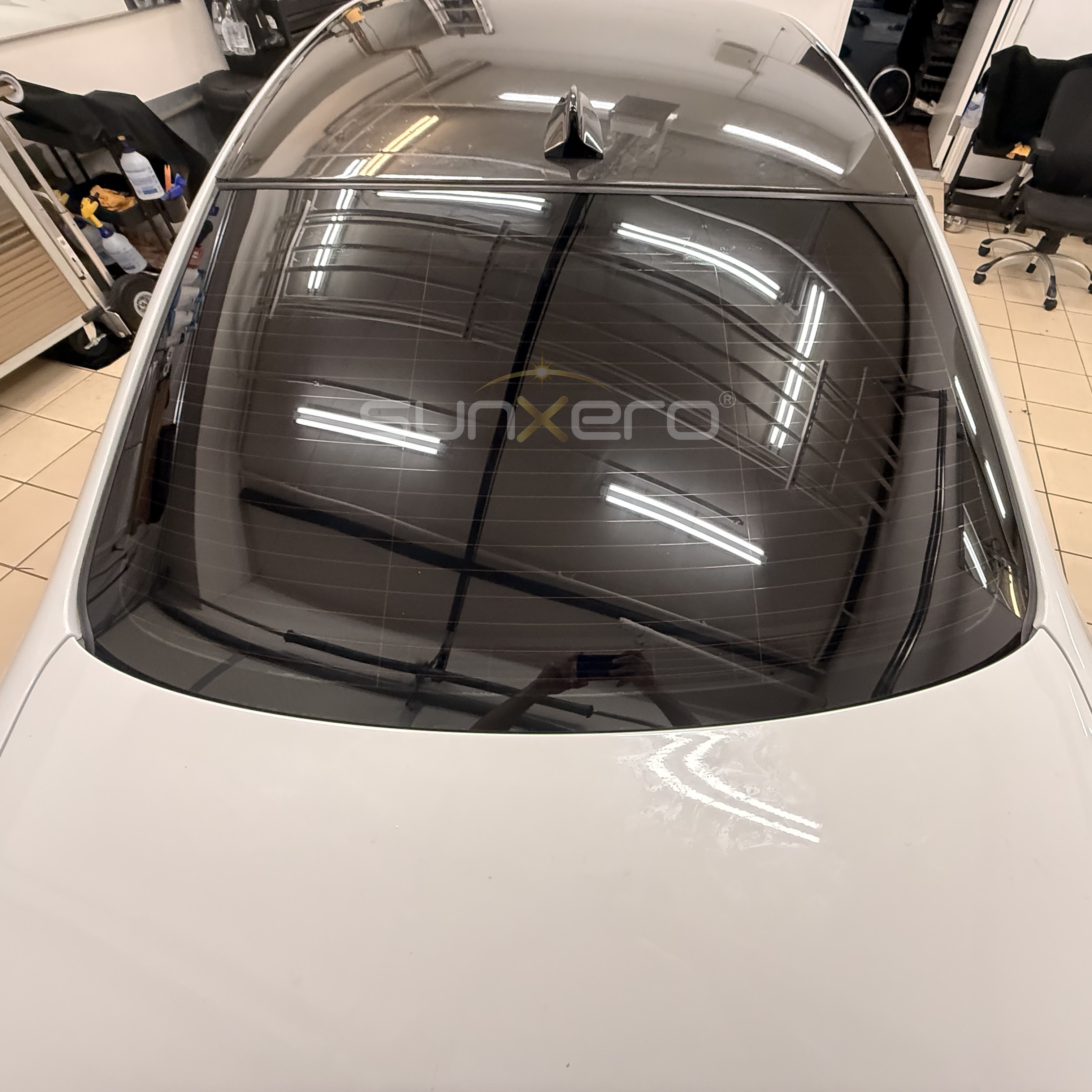White Car — Tinted Rear Window